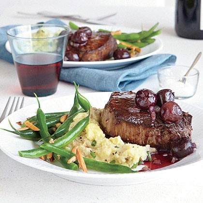 Seared steaks with red wine-cherry sauce