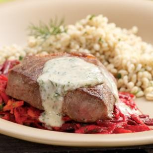 Seared strip steaks with horseradish-root vegetable slaw