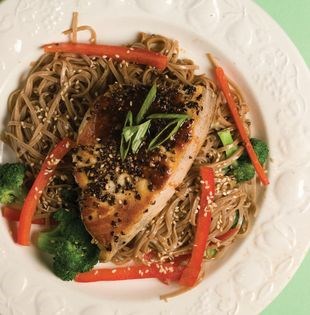 Seared swordfish over ginger-sesame noodles with Asian vinaigrette