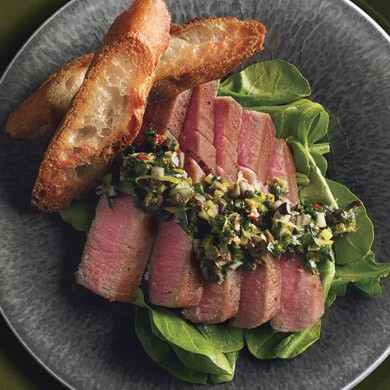 Seared tuna with olive-tapenade vinaigrette and arugula