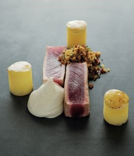 Seared tuna with tonka bean mayonnaise, smoked potato and jamón crumbs