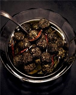 Seasoned labneh balls in olive oil