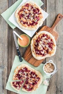 Seitan reuben pizza with caraway seed crust