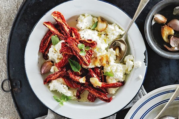 Semi-dried tomatoes & confit garlic on ricotta