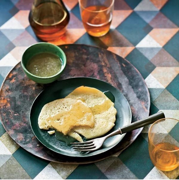 Semolina yeast pancakes with honey and butter (Beghrir)
