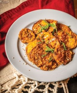 Sephardic fried eggplant with sesame seeds, mint, and honey