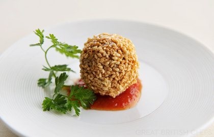 Sesame and cheddar croquettes with a tomato and chilli jam