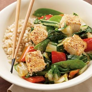 Sesame-crusted tofu over vegetables