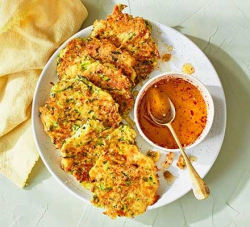 Sesame, halloumi & courgette fritters with chilli honey drizzle