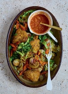Sesame-roast chicken with Savoy cabbage and tomato gravy