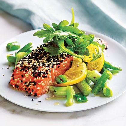 Sesame salmon with green onions and lemon