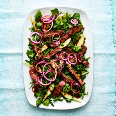 Shaking beef with a peppery pear salad