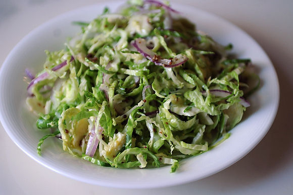 Shaved Brussels sprout salad with red onion, lemon and pecorino