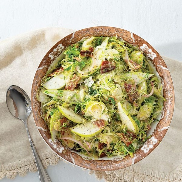 Shaved Brussels sprouts salad with hot bacon dressing