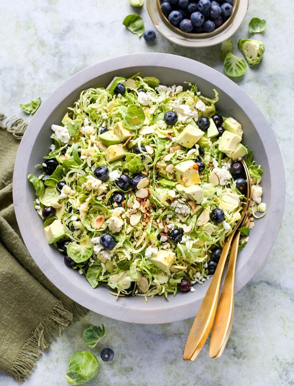 Shaved Brussels sprouts salad with blueberries, avocados and almonds