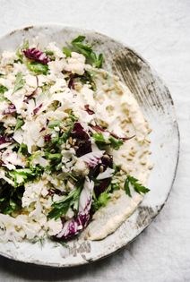 Shaved cauliflower salad with smoked whitefish mayo, lemon, radicchio, and herbs