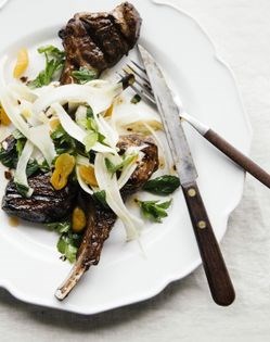 Shaved fennel salad with apricots, chili oil, parsley, mint, and lamb chops