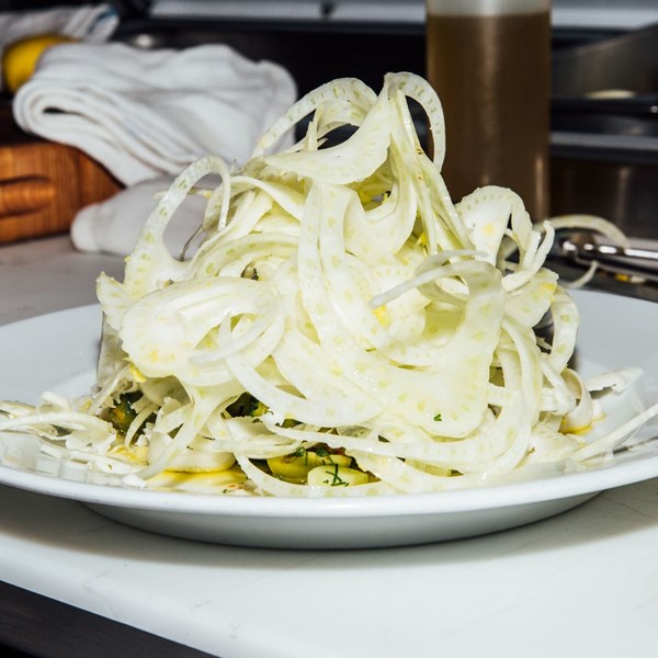 Shaved fennel salad with green olives and provolone