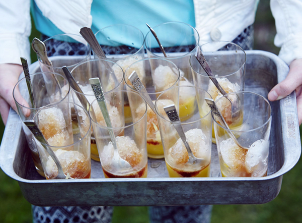 Shaved ice with cola syrup and tangerine curd