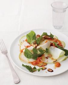 Shaved kohlrabi and arugula salad with chunky garlic and pimentón dressing