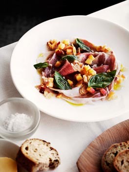 Shaved prosciutto with peach and almond salsa