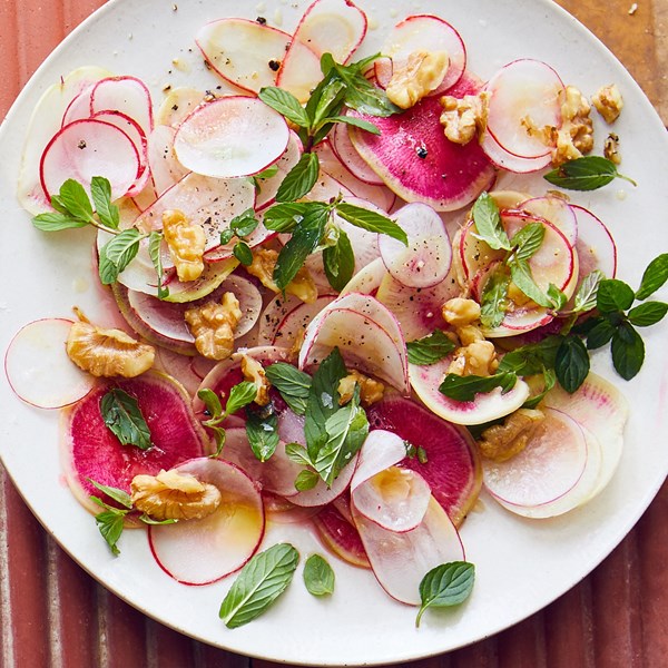 Shaved radish salad with walnuts and mint