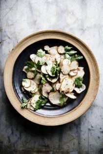 Shaved sunchokes with mustard vinaigrette and parsley