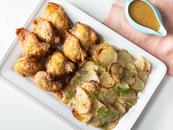 Sheet-pan chicken thighs with potatoes, fennel, and mustard-beer sauce