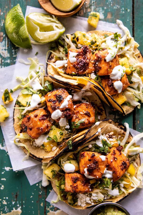 Sheet pan chipotle salmon tacos with pineapple jalapeño salsa