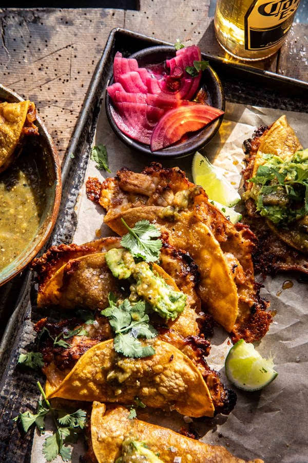 Sheet pan crispy chicken tacos with roasted jalapeño sesame verde