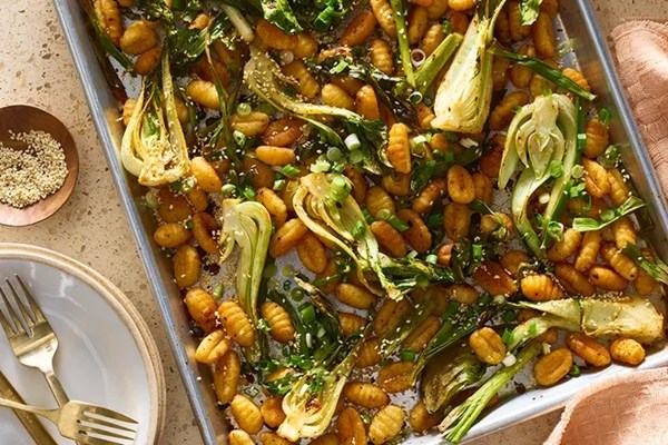 Sheet-pan gnocchi with chili crisp & baby bok choy