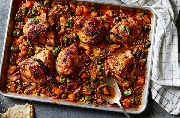 Sheet-pan harissa chicken with smashed olives & apricots