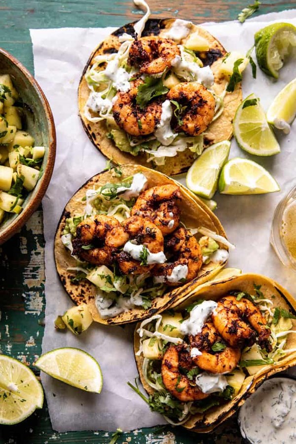 Sheet pan jalapeño pineapple shrimp tacos with cilantro garlic sauce