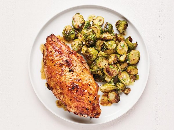 Sheet-pan lemon chicken and Brussels sprouts 
