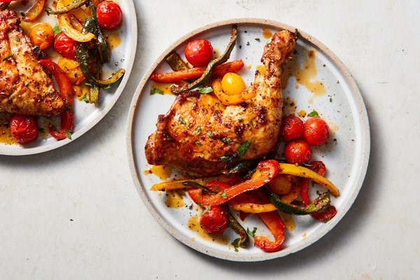Sheet-pan paprika chicken with tomatoes and Parmesan