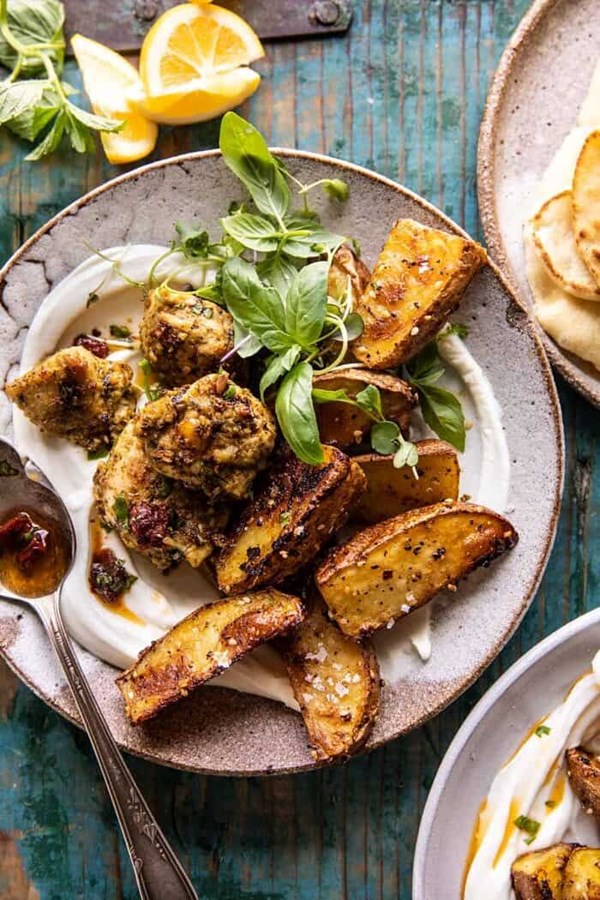 Sheet pan pesto chicken and lemon butter potatoes with whipped feta