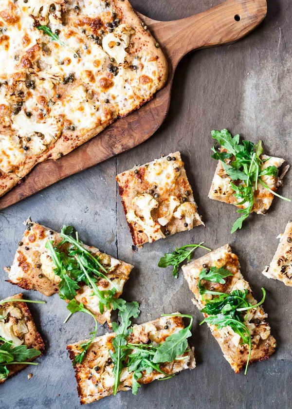 Sheet pan pizza with roasted cauliflower and greens