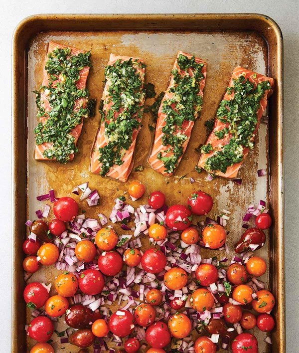 Sheet pan salmon with tomatoes and red onion