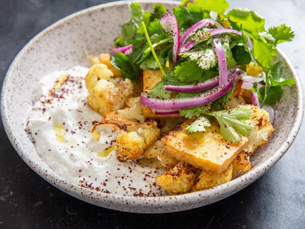Sheet-pan spiced cauliflower and tofu with ginger yogurt