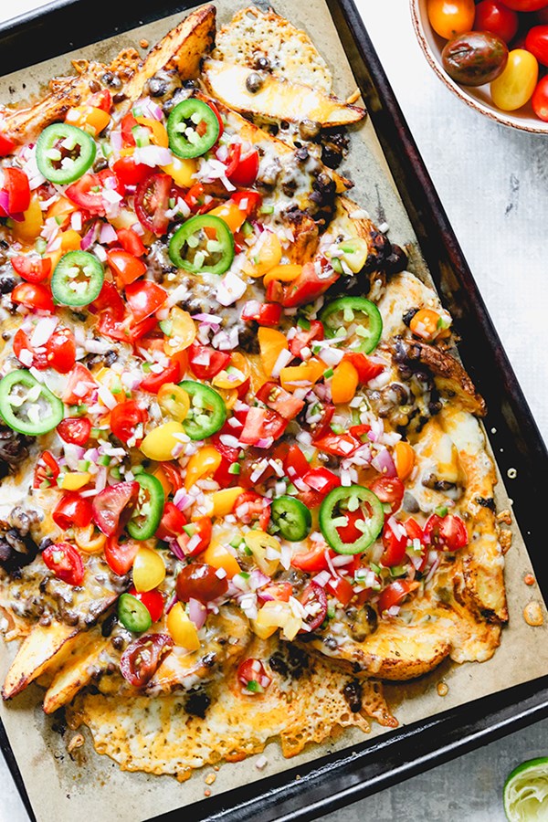 Sheet pan vegetarian roasted potato nachos with cherry tomato salsa
