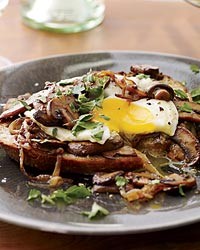Sherried mushrooms with fried eggs on toast