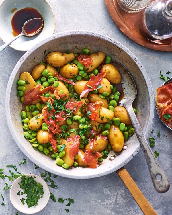 Sherry braised Jersey Royals with broad beans and serrano ham