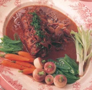 Shoulder of English lamb braised with red wine, oranges and rosemary [Stephen Ross]
