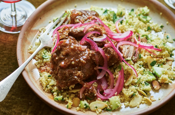 Shoulder of Iberico pork in rich tomato sauce with lemony couscous