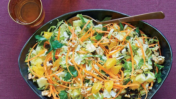 Shredded Brussels sprout salad with spicy toasted walnuts and currants