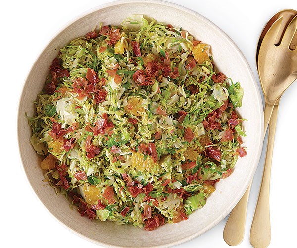 Shredded Brussels sprouts salad with oranges, toasted walnuts and crisp prosciutto