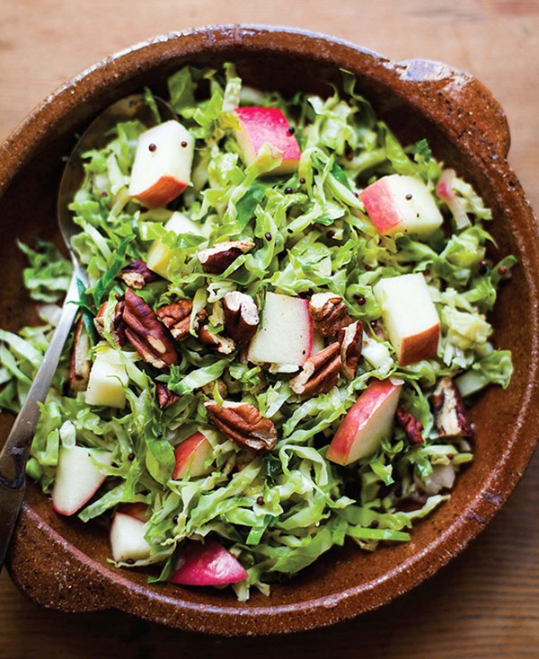 Shredded Brussels sprouts with apples and mustard seeds