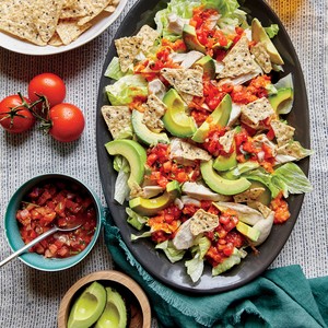 Shredded chicken and avocado nacho salad