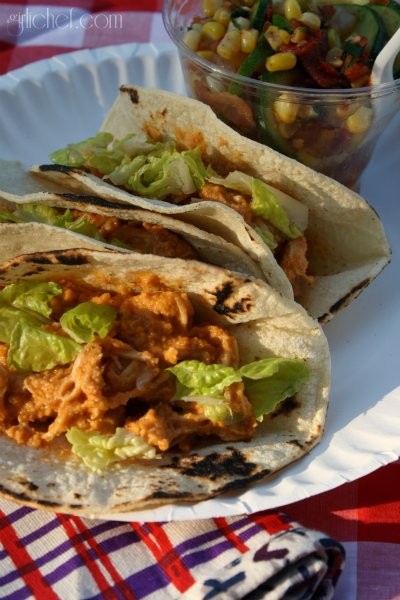 Shredded chicken in peanut sauce tacos