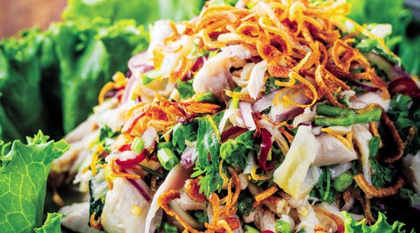 Shredded chicken salad with herbs, fish sauce, and lime (Yum gai)
